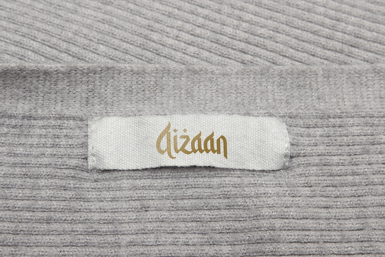 Aizaan Clothing Fabric Label Application